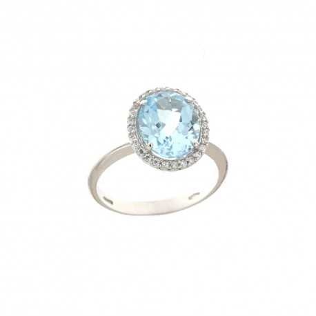 Prsten z 18kt bílého zlata se světle modrým oválným kamenem a bílými zirkony