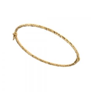 жесткий браслет из...