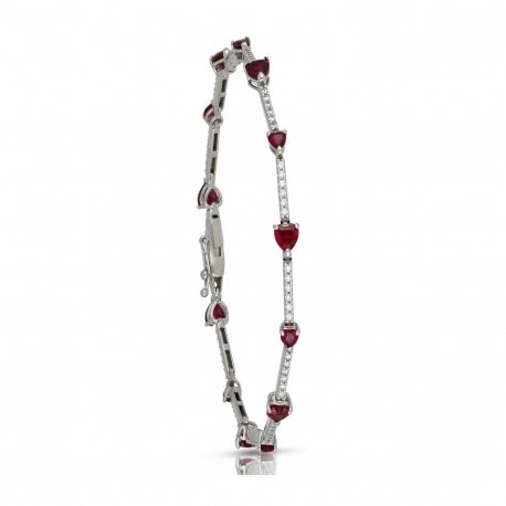 Tenisový náramek z 18kt bílého zlata s dámskými srdíčky