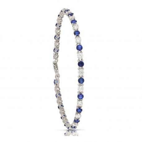 Pulseira tênis em ouro branco 18K com zircões brancos e azuis