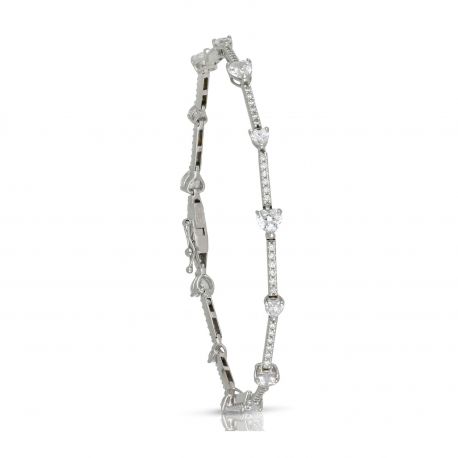 Pulsera tenis en oro blanco de 18 kt con circonitas blancas en forma de corazón para mujer